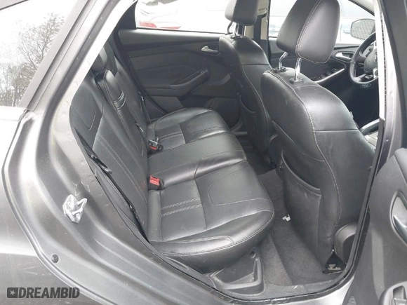 2012 Ford Focus SEL with VIN 1FAHP3H23CL348356, listed as a IAAI auction lot 42041001 with 174,510 mi miles. Bid and sale history available at carsss.com. Image 8.