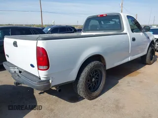 2004 Ford F-150 XL with VIN 2FTRF17WX4CA74272, listed as a IAAI auction lot 42657638 with 119,928 mi miles and . Bid and sale history available at DreamBid. Image 4.