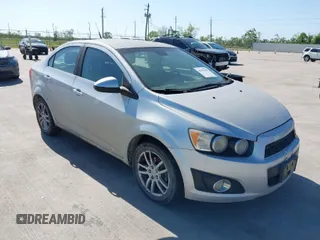2012 Chevrolet Sonic LT with VIN 1G1JC5SH9C4146446, listed as a IAAI auction lot 41979205 with 149,895 mi miles and . Bid and sale history available at DreamBid. Image 1.