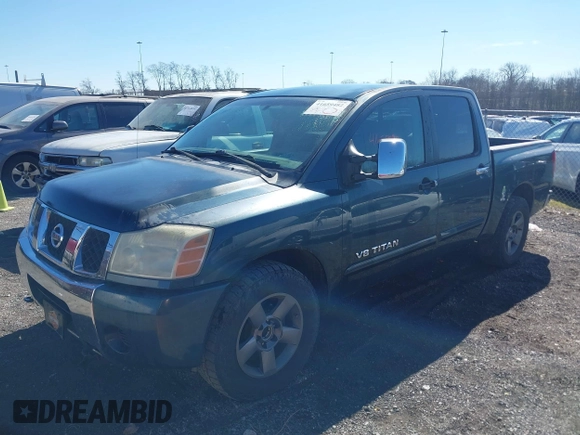 2005 Nissan Titan XE with VIN 1N6AA07A65N512479, listed as a IAAI auction lot 41659482 with 225,037 mi miles and . Bid and sale history available at DreamBid. Image 6.
