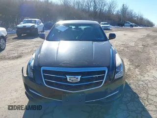 2016 Cadillac ATS Standard AWD z VIN 1G6AG5RX5G0103585, wystawiony jako IAAI lot #41439995 z przebiegiem 58 615 mil mil oraz . Historia ofert i sprzedaży dostępna na DreamBid. Obrazek 13.