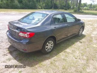 2011 Toyota Corolla L with VIN 2T1BU4EE0BC680158, listed as a IAAI auction lot 42060987 with 131,669 mi miles. Bid and sale history available at carsss.com. Image 4.