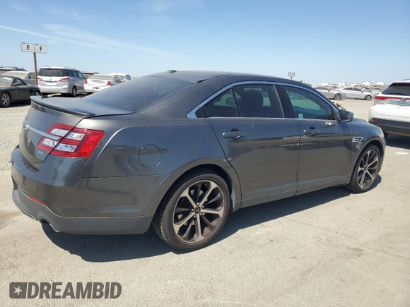2015 Ford Taurus SEL with VIN 1FAHP2E8XFG209390, listed as a Copart auction lot 58992305 with 99,498 mi miles and Salvage title. Bid and sale history available at DreamBid. Image 3.