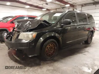 2015 Dodge Grand Caravan SXT with VIN 2C4RDGCG8FR518739, listed as a IAAI auction lot 41704911 with 278,478 mi miles and . Bid and sale history available at DreamBid. Image 2.