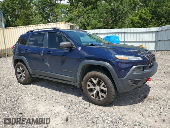 2014 Jeep Cherokee Trailhawk with VIN 1C4PJMBS7EW170345, listed as a Copart auction lot 60565765 with 98,382 mi miles and Salvage title. Bid and sale history available at DreamBid. Image 4.
