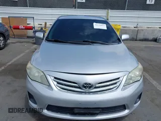 2013 Toyota Corolla L with VIN 2T1BU4EE9DC948109, listed as a IAAI auction lot 42136011 with 166,663 mi miles and . Bid and sale history available at DreamBid. Image 12.