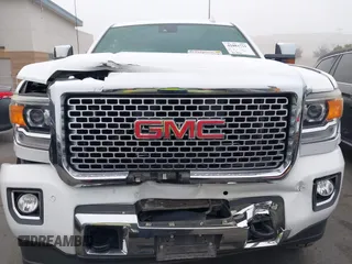 2015 GMC Sierra 2500HD Denali with VIN 1GT120E85FF681680, listed as a IAAI auction lot 42081711 with 67,676 mi miles and . Bid and sale history available at DreamBid. Image 12.