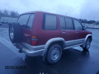 1995 Isuzu Trooper z VIN JACDJ58W9S7901686, wystawiony jako Copart lot #86925604 z przebiegiem 77 643 mil mil oraz Szkody całkowita. Historia ofert i sprzedaży dostępna na DreamBid. Obrazek 3.