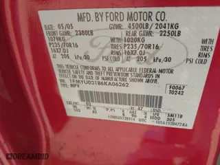 2006 Ford Escape XLT with VIN 1FMYU03186KA06262, listed as a IAAI auction lot 41912605 with 157,117 mi miles. Bid and sale history available at carsss.com. Image 9.