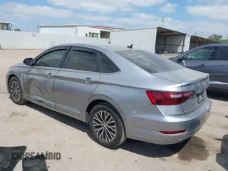 2021 Volkswagen Jetta S z VIN 3VWC57BU9MM015930, wystawiony jako IAAI lot #42020727 z przebiegiem 67 982 mil mil oraz . Historia ofert i sprzedaży dostępna na DreamBid. Obrazek 3.
