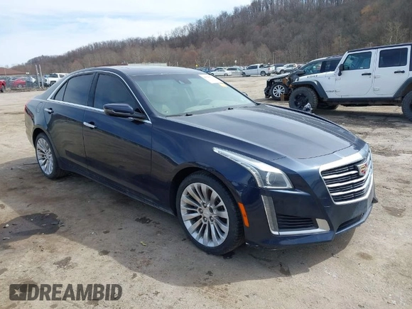 2016 Cadillac CTS Luxury Collection AWD with VIN 1G6AX5SX2G0176665, listed as a IAAI auction lot 41793579 with 67,985 mi miles and . Bid and sale history available at DreamBid. Image 1.