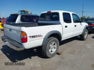2001 Toyota Tacoma PreRunner z VIN 5TEGN92N91Z852586, wystawiony jako IAAI lot #42299321 z przebiegiem 233 111 mil mil oraz . Historia ofert i sprzedaży dostępna na DreamBid. Obrazek 4.