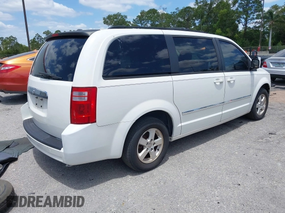2008 Dodge Grand Caravan SXT with VIN 2D8HN54P58R839914, listed as a IAAI auction lot 42170038 with 152,736 mi miles and . Bid and sale history available at DreamBid. Image 4.
