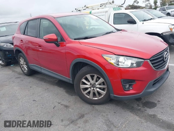 2016 Mazda CX-5 Touring with VIN JM3KE2CY3G0877185, listed as a IAAI auction lot 41729243 with 144,656 mi miles. Bid and sale history available at carsss.com. Image 1.