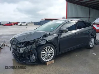 2017 Ford Focus Titanium with VIN 1FADP3N20HL210364, listed as a IAAI auction lot 42130643 with 132,312 mi miles and . Bid and sale history available at DreamBid. Image 22.