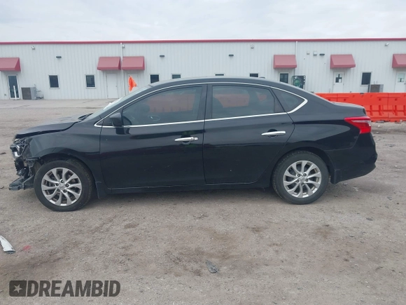 2018 Nissan Sentra S with VIN 3N1AB7AP4JY258244, listed as a IAAI auction lot 41640588 with 119,803 mi miles and . Bid and sale history available at DreamBid. Image 14.