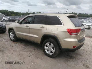 2012 Jeep Grand Cherokee Laredo with VIN 1C4RJEAGXCC157616, listed as a IAAI auction lot 42156539 with 301,661 mi miles. Bid and sale history available at carsss.com. Image 3.