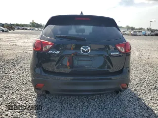 2014 Mazda CX-5 Sport with VIN JM3KE2BE3E0361736, listed as a Copart auction lot 64306405 with 114,468 mi miles and Clean title. Bid and sale history available at DreamBid. Image 6.