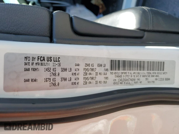 2017 Jeep Grand Cherokee Altitude with VIN 1C4RJEAG4HC740240, listed as a Copart auction lot 57677295 with Not provided miles and Salvage title. Bid and sale history available at DreamBid. Image 13.