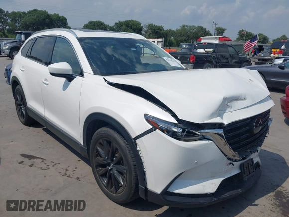2022 Mazda CX-9 Touring Plus with VIN JM3TCBAY3N0626046, listed as a IAAI auction lot 42170265 with 21,823 mi miles and . Bid and sale history available at DreamBid. Image 1.
