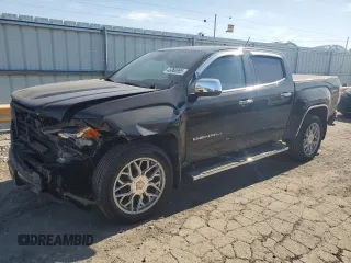 2021 GMC Canyon 4WD Denali with VIN 1GTG6EEN4M1221938, listed as a Copart auction lot 48760965 with 63,231 mi miles and Salvage Title. Bid and sale history available at carsss.com. Image 1.