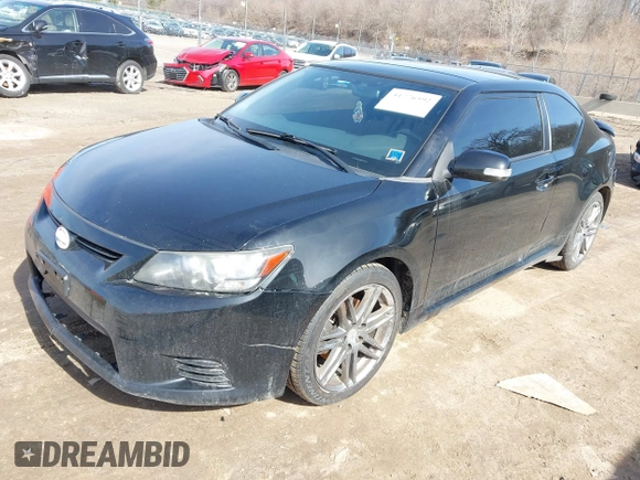 2013 Scion tC with VIN JTKJF5C74D3063012, listed as a IAAI auction lot 41776592 with 142,071 mi miles. Bid and sale history available at carsss.com. Image 2.