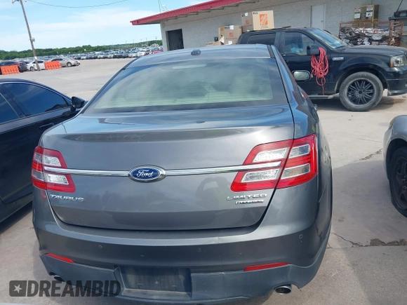 2014 Ford Taurus Limited z VIN 1FAHP2F82EG127439, wystawiony jako IAAI lot #42320119 z przebiegiem 191 876 mil mil oraz . Historia ofert i sprzedaży dostępna na DreamBid. Obrazek 16.
