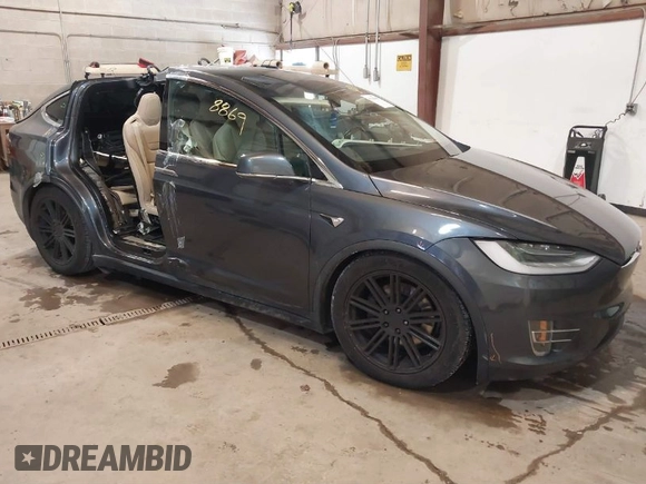 2016 Tesla Model X 70D with VIN 5YJXCBE2XGF025303, listed as a IAAI auction lot 41558869 with 77,793 mi miles and . Bid and sale history available at DreamBid. Image 1.