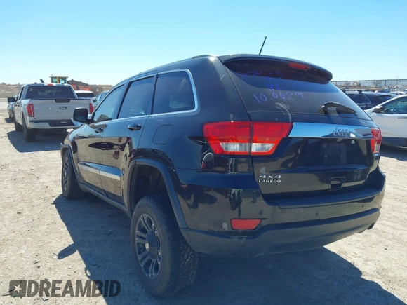 2013 Jeep Grand Cherokee Laredo with VIN 1C4RJFAG2DC643926, listed as a IAAI auction lot 41723575 with 125,048 mi miles. Bid and sale history available at carsss.com. Image 3.