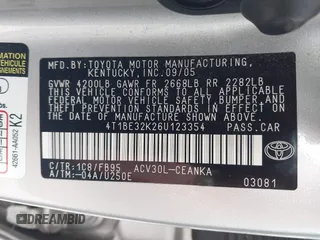 2006 Toyota Camry STD z VIN 4T1BE32K26U123354, wystawiony jako IAAI lot #42436572 z przebiegiem 216 876 mil mil oraz . Historia ofert i sprzedaży dostępna na DreamBid. Obrazek 9.