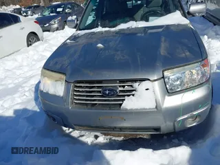 2007 Subaru Forester X w/Premium Pkg with VIN JF1SG65687H732558, listed as a IAAI auction lot 41241527 with 178,967 mi miles. Bid and sale history available at carsss.com. Image 12.