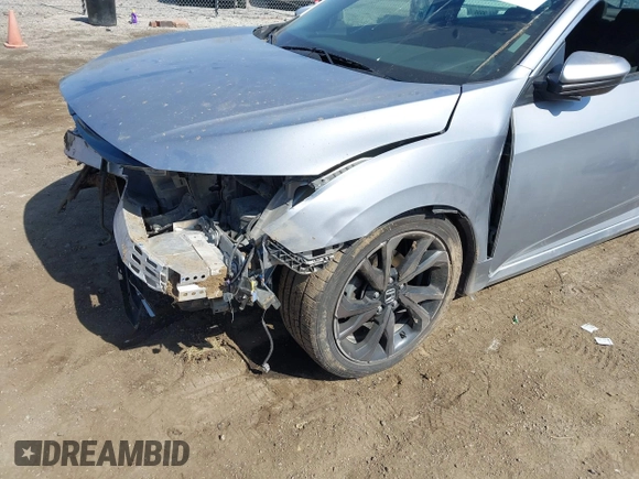 2021 Honda Civic Sport with VIN 2HGFC2F83MH540939, listed as a IAAI auction lot 41789508 with 100,274 mi miles and . Bid and sale history available at DreamBid. Image 6.