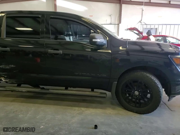 2018 Nissan Titan SV with VIN 1N6AA1E67JN535056, listed as a Copart auction lot 87011104 with 107,391 mi miles and Salvage Title. Bid and sale history available at carsss.com. Image 13.