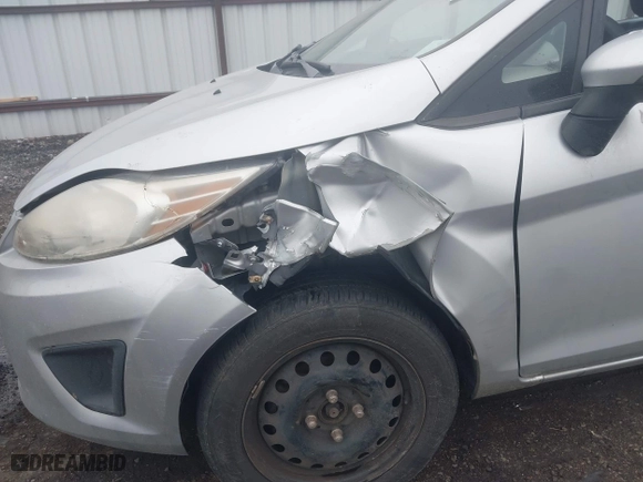 2013 Ford Fiesta SE with VIN 3FADP4BJ3DM176706, listed as a IAAI auction lot 42047063 with 126,799 mi miles. Bid and sale history available at carsss.com. Image 6.