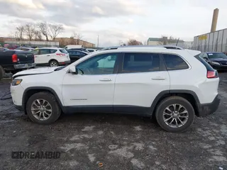 2019 Jeep Cherokee Latitude Plus with VIN 1C4PJMLX2KD254946, listed as a IAAI auction lot 41581777 with 49,748 mi miles. Bid and sale history available at carsss.com. Image 14.