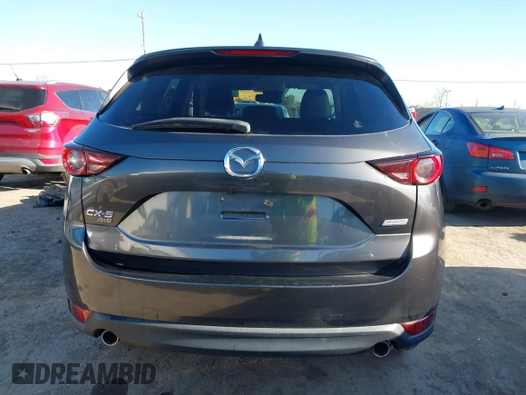 2017 Mazda CX-5 Touring with VIN JM3KFBCL2H0165625, listed as a IAAI auction lot 41879145 with 64,745 mi miles. Bid and sale history available at carsss.com. Image 16.