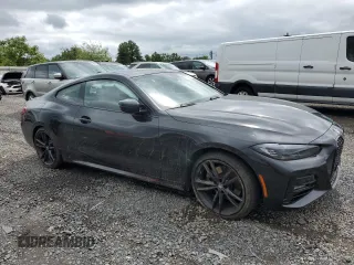 2022 BMW 4 Series 430i xDrive with VIN WBA73AP01NCJ51756, listed as a Copart auction lot 58590465 with Not provided miles and Salvage title. Bid and sale history available at DreamBid. Image 4.