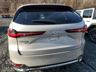 2024 Mazda CX-90 Premium Plus z VIN JM3KKEHD0R1182529, wystawiony jako Copart lot #85731504 z przebiegiem Nie podano mil oraz Szkoda całkowita • Salvage title. Historia ofert i sprzedaży dostępna na DreamBid. Obrazek 6.