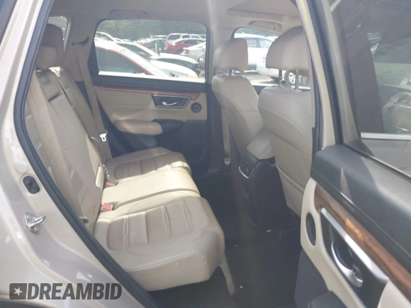 2018 Honda CR-V Touring with VIN 5J6RW2H96JL000910, listed as a IAAI auction lot 42490580 with 201,534 mi miles and . Bid and sale history available at DreamBid. Image 8.