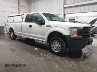 2019 Ford F-150 XL with VIN 1FTEX1E56KKD51823, listed as a IAAI auction lot 41768035 with 96,164 mi miles and . Bid and sale history available at DreamBid. Image 1.