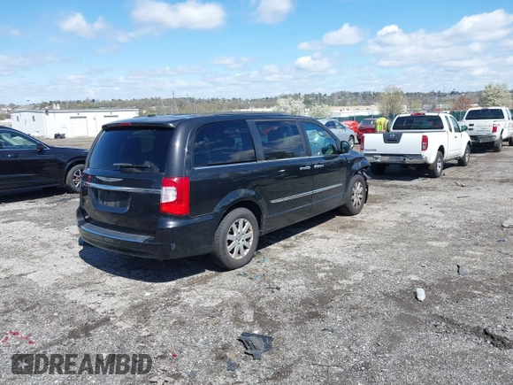 2015 Chrysler Town & Country Touring with VIN 2C4RC1BG5FR521339, listed as a IAAI auction lot 41984089 with 107,275 mi miles and . Bid and sale history available at DreamBid. Image 4.