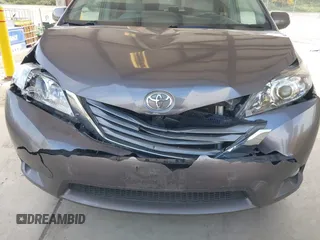 2014 Toyota Sienna Limited z VIN 5TDDK3DC9ES088584, wystawiony jako IAAI lot #42333016 z przebiegiem 115 138 mil mil oraz . Historia ofert i sprzedaży dostępna na DreamBid. Obrazek 6.