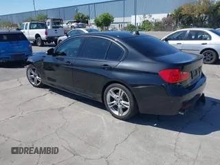 2014 BMW 3 Series 328i with VIN WBA3C1C54EK112620, listed as a IAAI auction lot 42712414 with 169,297 mi miles and . Bid and sale history available at DreamBid. Image 3.