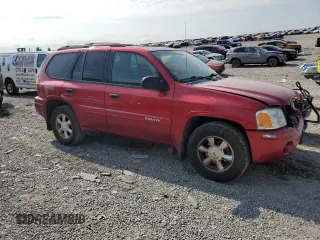 2004 GMC Envoy SLT with VIN 1GKDT13S542237139, listed as a Copart auction lot 66352174 with 174,344 mi miles and Salvage Title. Bid and sale history available at carsss.com. Image 4.