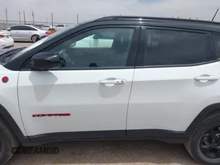2023 Jeep Compass Trailhawk with VIN 3C4NJDDN3PT544408, listed as a IAAI auction lot 42253800 with 53,105 mi miles and . Bid and sale history available at DreamBid. Image 14.