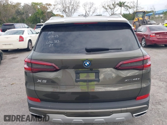 2022 BMW X5 xDrive45e z VIN 5UXTA6C00N9L06383, wystawiony jako IAAI lot #38552162 z przebiegiem 19 592 mil mil oraz . Historia ofert i sprzedaży dostępna na DreamBid. Obrazek 16.