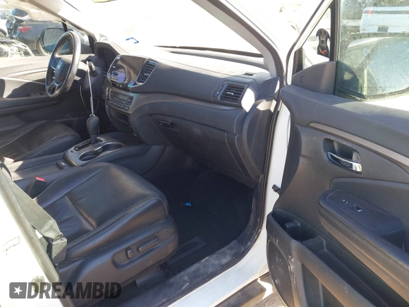 2019 Honda Pilot EX-L with VIN 5FNYF5H59KB017415, listed as a IAAI auction lot 41340852 with 125,433 mi miles and . Bid and sale history available at DreamBid. Image 5.