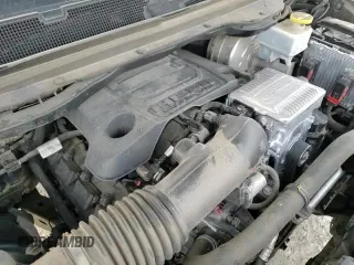 2021 Ram 1500 Big Horn z VIN 1C6RREFT1MN630881, wystawiony jako Copart lot #55024865 z przebiegiem 104 583 mil mil oraz Szkoda całkowita • Salvage title. Historia ofert i sprzedaży dostępna na DreamBid. Obrazek 13.