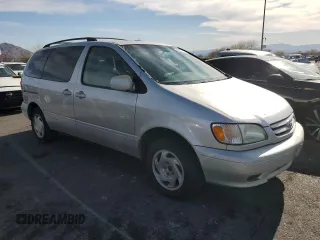 2002 Toyota Sienna LE with VIN 4T3ZF13C12U501575, listed as a Copart auction lot 49930145 with 247,327 mi miles and Clean Title. Bid and sale history available at carsss.com. Image 4.