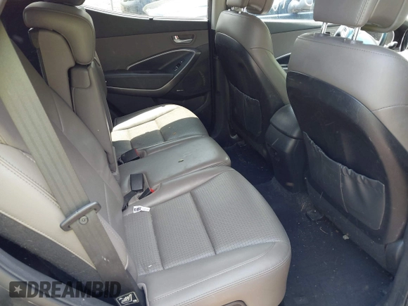 2014 Hyundai Santa Fe with VIN 5XYZUDLB6EG218980, listed as a IAAI auction lot 42391630 with 136,710 mi miles and . Bid and sale history available at DreamBid. Image 8.